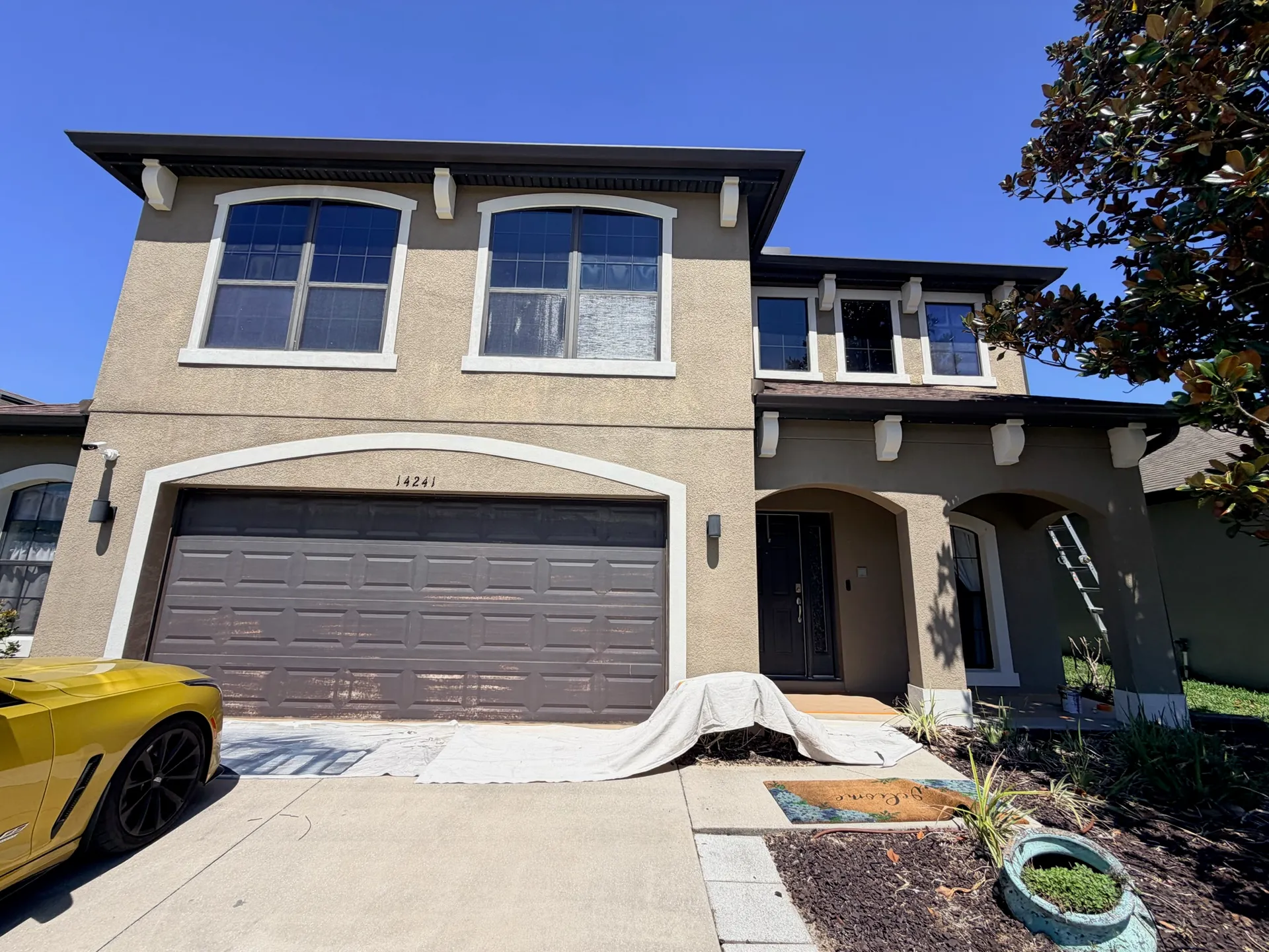 Faded exterior paint before repainting Tampa - Premier Contractors FL
