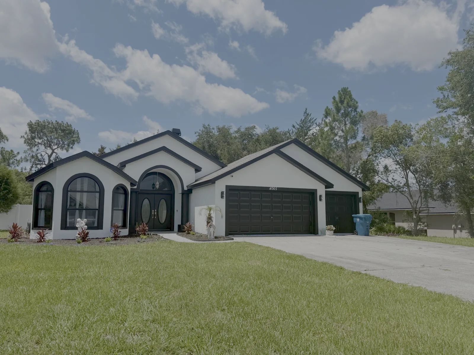 Modern white and black exterior repaint Tampa - Premier Contractors FL