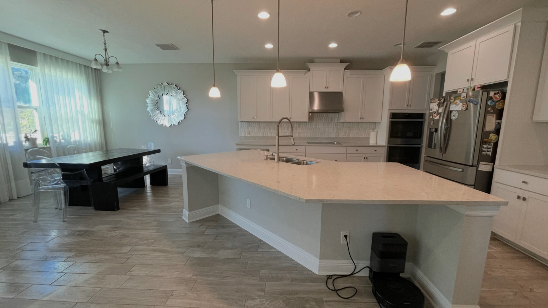 Kitchen with painted cabinets and island Tampa - Premier Contractors FL